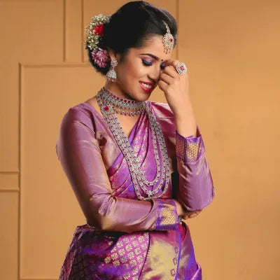 Royal Banarasi sarees with heritage weaving, luxurious finish, and bold statement.