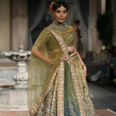 Designer lehengas curated for weddings, sangeet nights, and bridal celebrations.