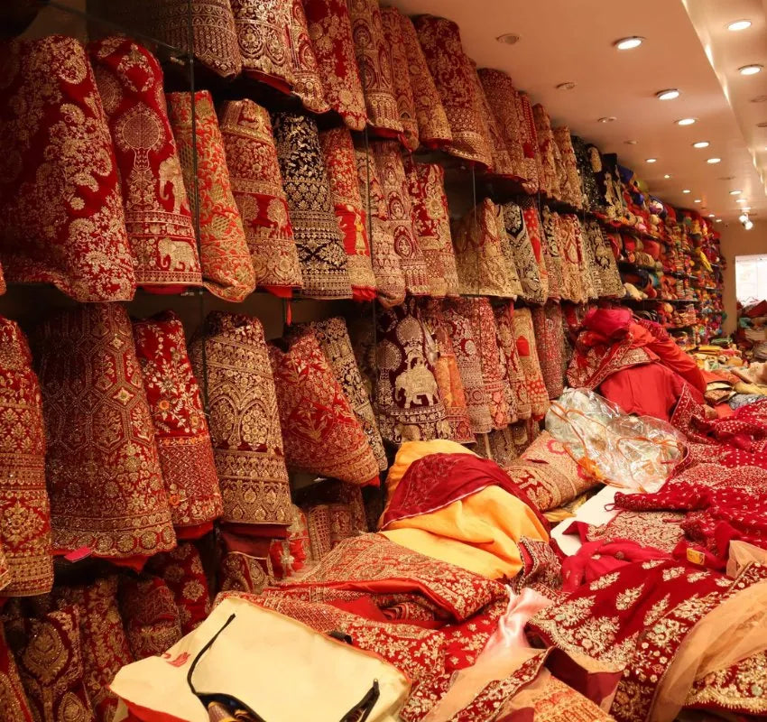 Suratsilkhouse wholesale unit for resellers and boutiques featuring bulk Banarasi sarees, partywear lehengas, and unstitched dress materials at manufacturer prices.